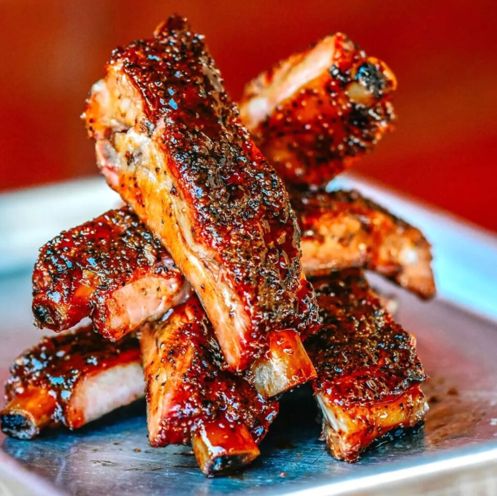 Rack of BBQ ribs on a plate